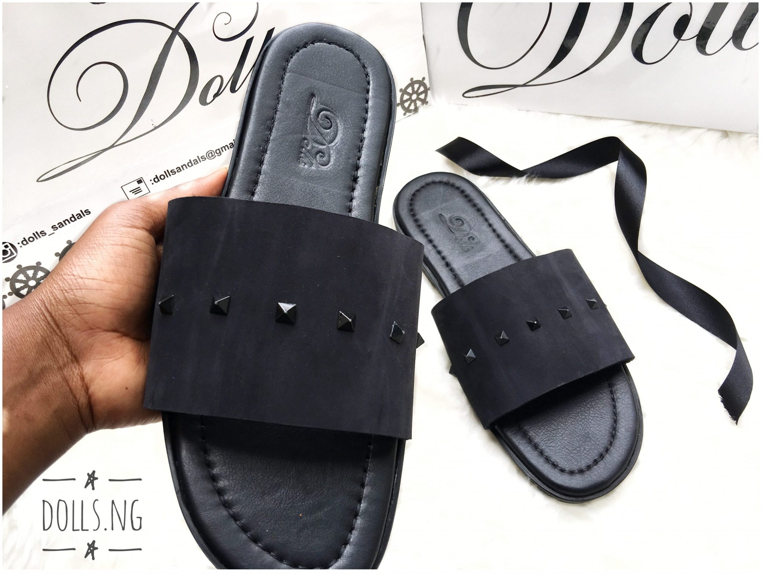 picture of a pair of men sandals with stones by Dolls leather products